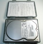 裸族の弁当箱にHDDを入れる。保証書もついでに。
